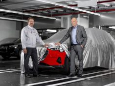 Peter Kössler, Board of Management Member for Production and Logistics at AUDI AG and Chairman of the Board of Directors of Audi Brussels (on the right), peers the first Audi e-tron models from series production. He is accompanied by Patrick Danau, Managing Director of Audi Brussels.